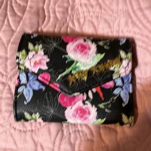Betsy Johnson Wallet, flowered against black background several card slots.
